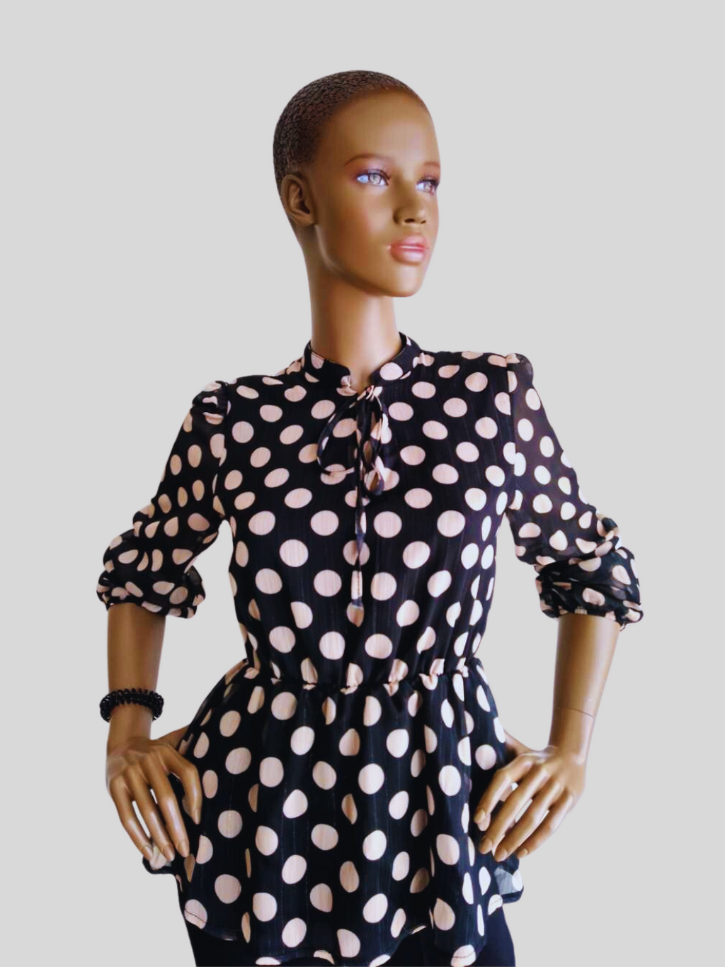 Blouse péplum NOIRE à pois