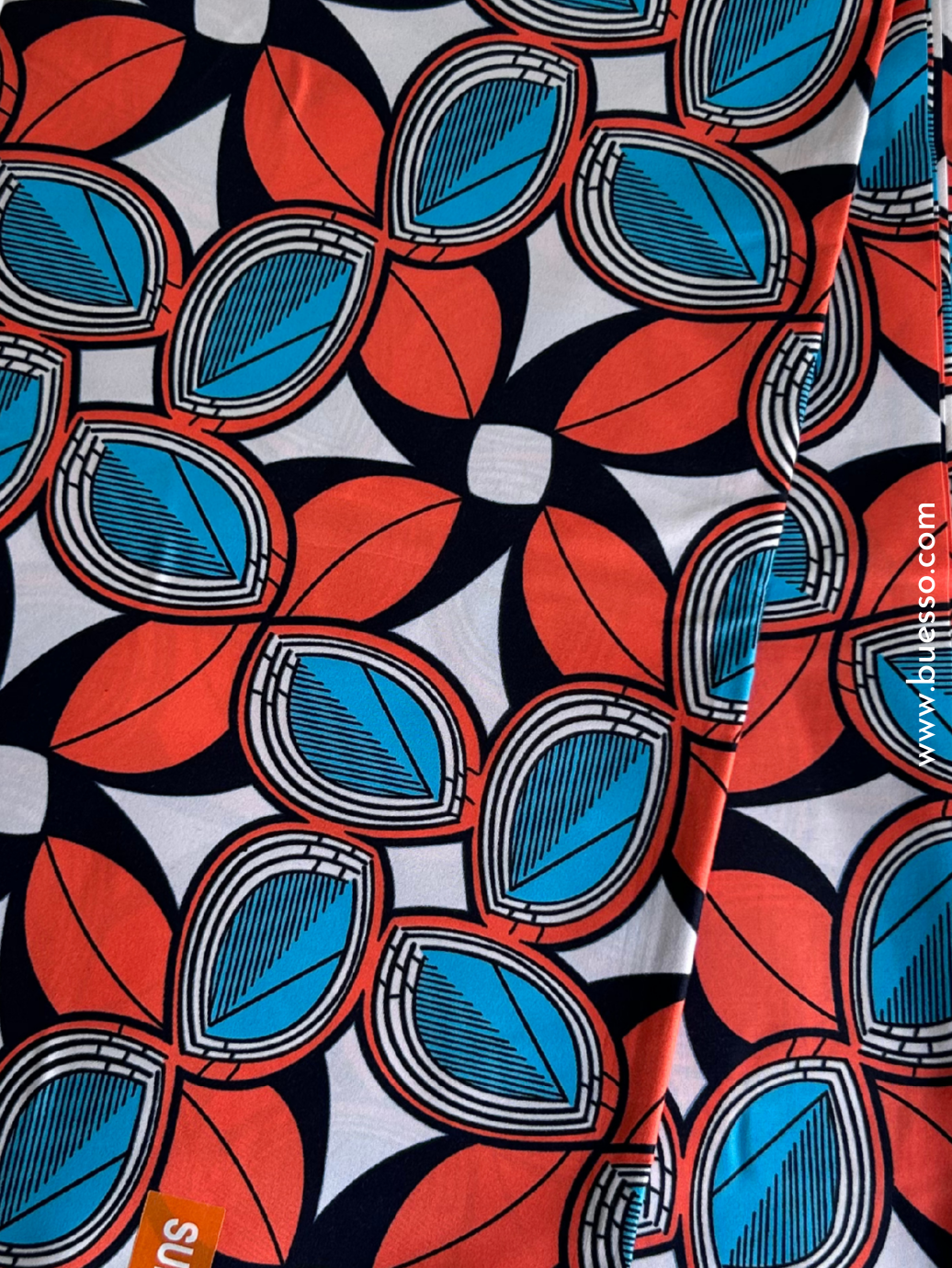Tissu Wax authentique motif feuilles oranges & bleues