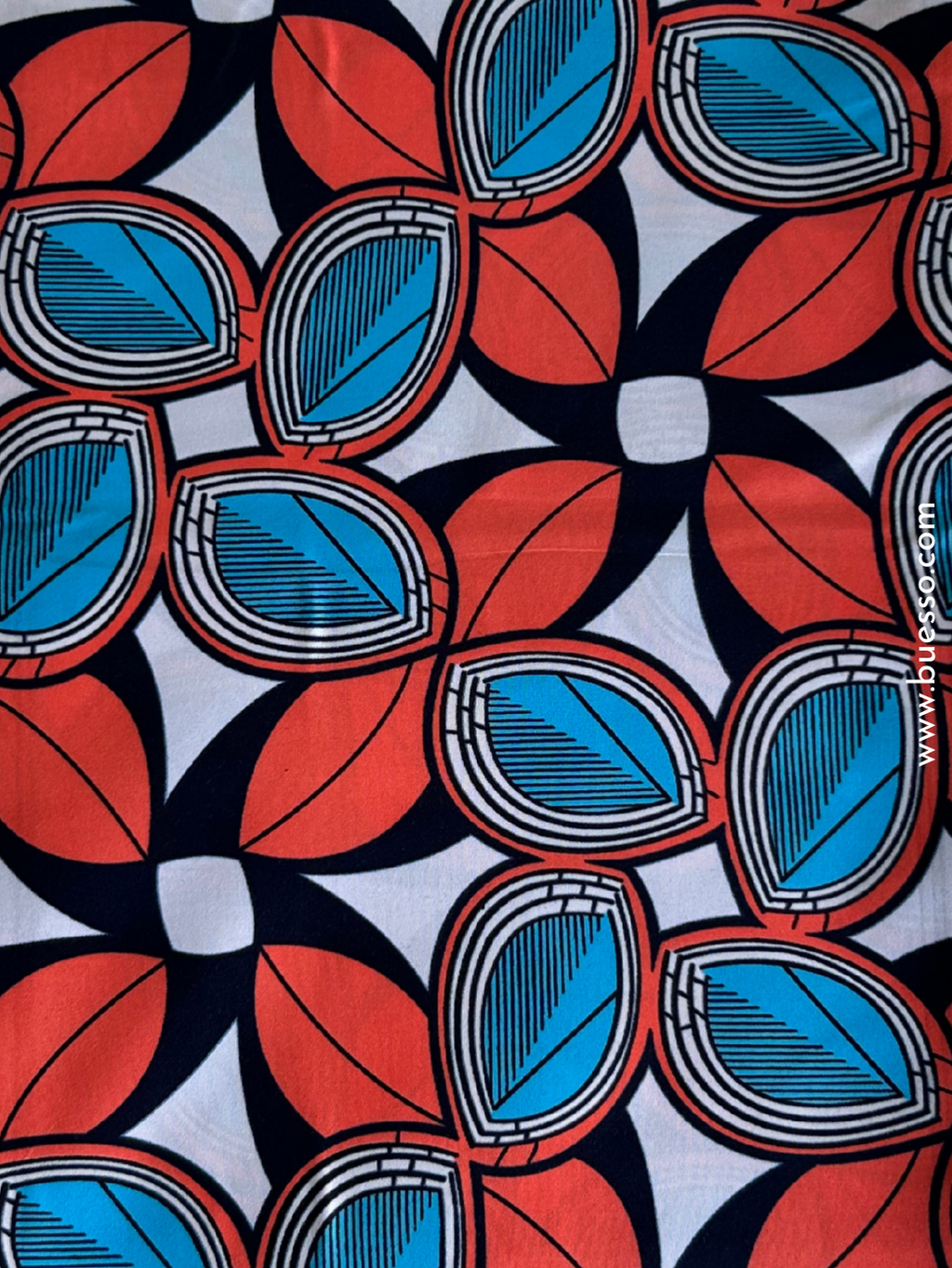 Tissu Wax authentique motif feuilles oranges & bleues